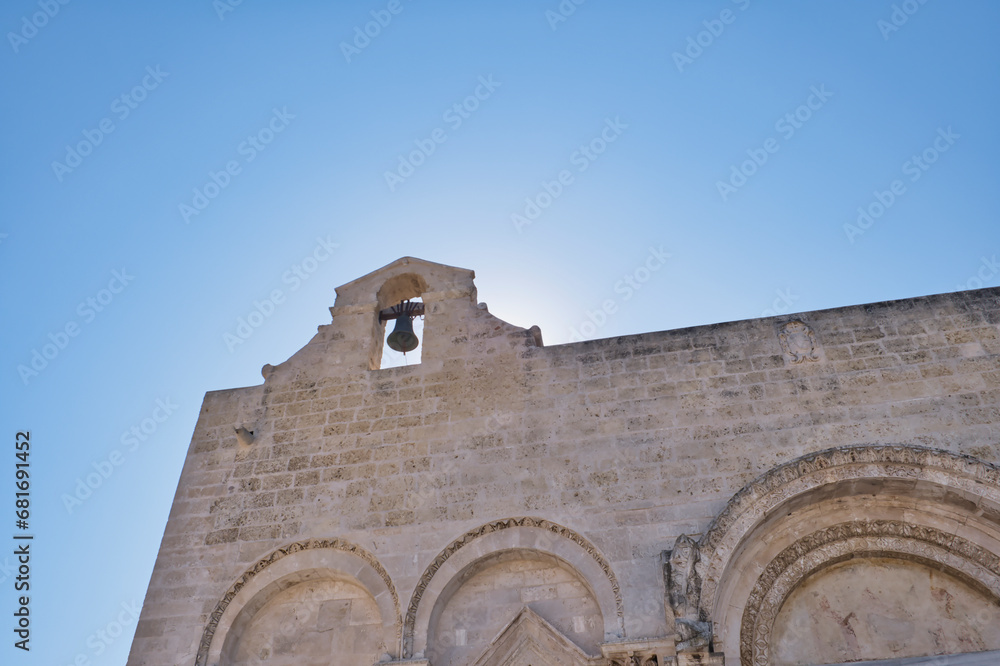 Detail view, bell tower of the church of Siponto called Santa Maria di Siponto in Manfredonia, Italy