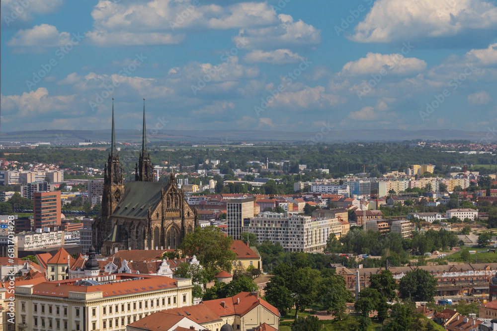 View of the city of Brno in the Czech Republic in Europe from the Špilberk viewpoint. The dominant feature of Brno is the Cathedral of St. Peter - Petrov. There is a beautiful sky in the background..​