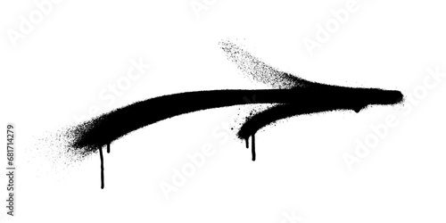 Graffiti arrow with overspray in black over white.