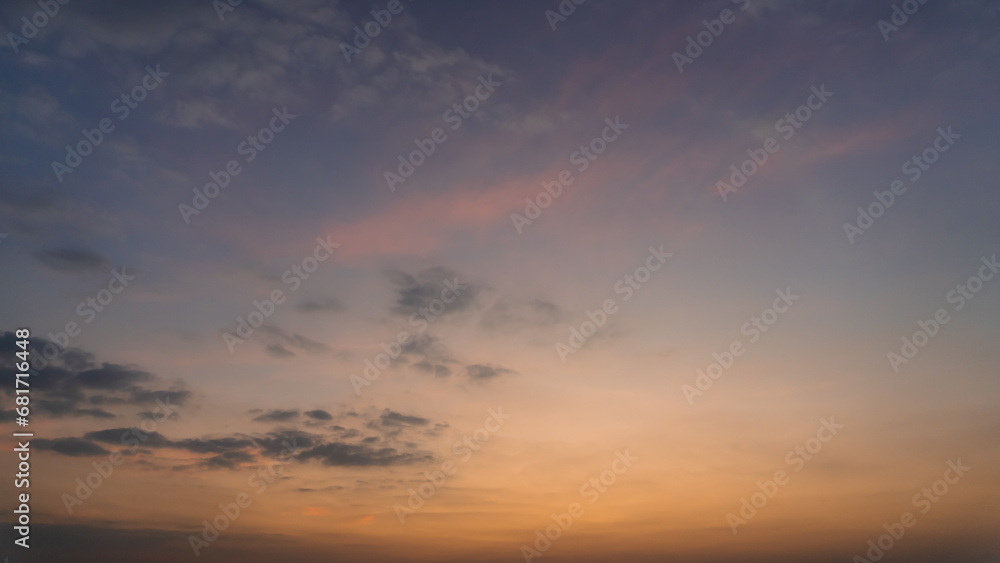 Background of colorful pastel sky, Dramatic sunset with twilight color sky and clouds.