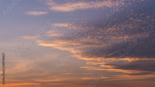 Background of colorful pastel sky, Dramatic sunset with twilight color sky and clouds.