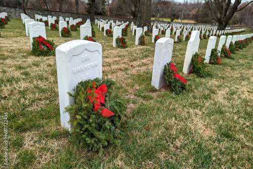 Christmas wreaths on the graves tombs of USA War Veterans in national cemetery, military photo