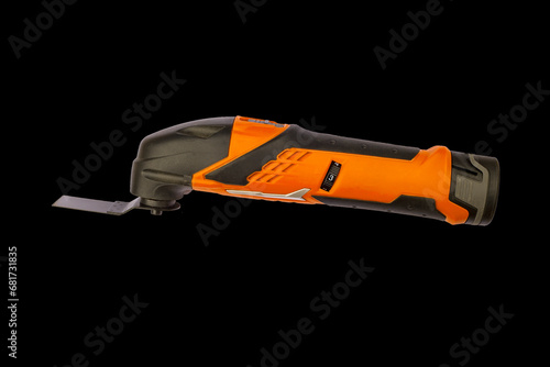 Obraz na płótnie Cordless multi tool, isolated on black background. Professional tool