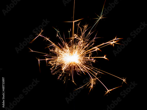 Sparklers on black isolated background. Sparks from a burning sparkler. To insert an image in a blend mode