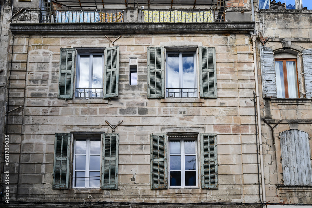 Fototapeta premium Ancient and historic old door and windows in France