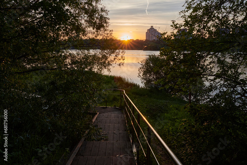 Russia. Moscow. Sunset on Borisov Ponds. Path to the shore photo