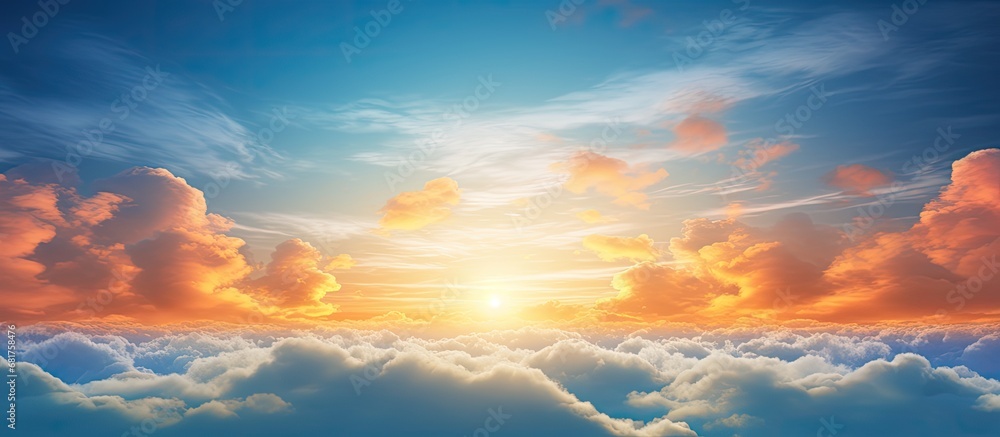 In the early morning of a summer day, the sky transformed into a stunning canvas of orange and blue, as the sun's rays created an abstract, textured effect on the white clouds, with bokeh of light In the early morning of a summer day, the sky transformed into a stunning canvas of orange and blue, as the sun's rays created an abstract, textured effect on the white clouds, with bokeh of light