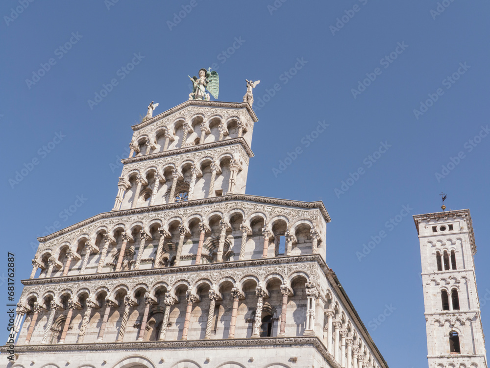 Detail of the artistic facade of the Church of Saint Michael in Foro in Lucca, Tuscany, Italy