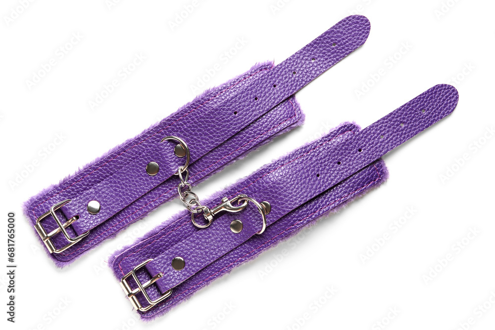 Purple handcuffs from sex shop on white background Purple handcuffs from sex shop on white background