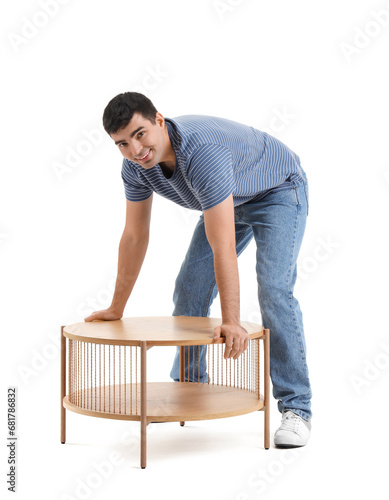 Young man carrying coffee t...