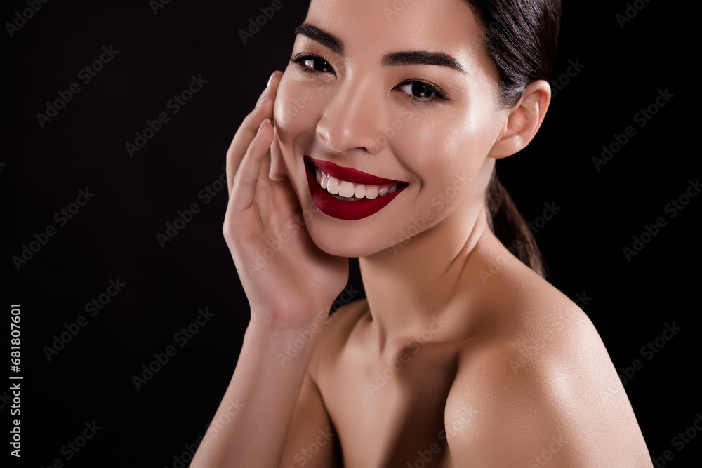 Photo of attractive chic lady touch apply new balm on face enjoy soft smooth flawless effect over dark background