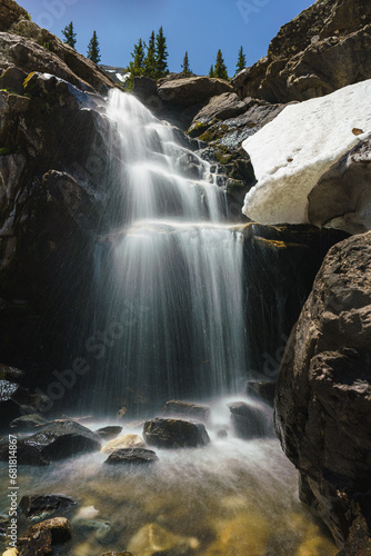 Snow melt turning into a waterfall in the Rocky Mountains