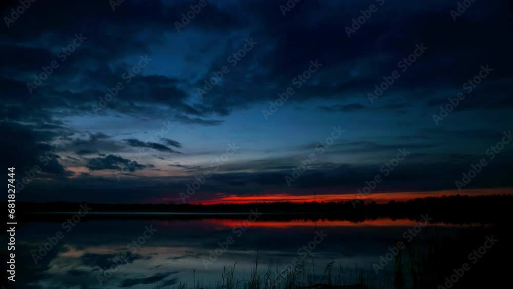 Dark sunset with fading red over the horizon of trees. Dark sunset with fading red over the horizon of trees.