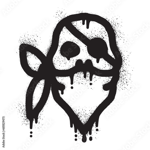 Pirate skull graffiti wearing a bandanna with sprayed paint