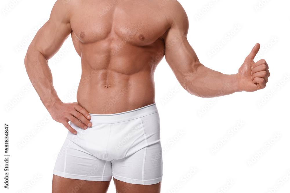 Young man is stylish underwear showing thumb up on white background, closeup Young man is stylish underwear showing thumb up on white background, closeup