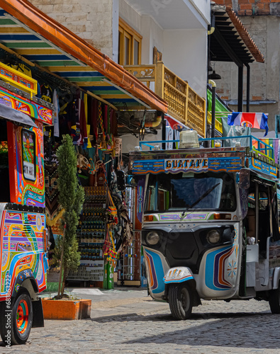 Motorcycle taxi in a colonial town in Colombia, tutu, guatapé, 2023.