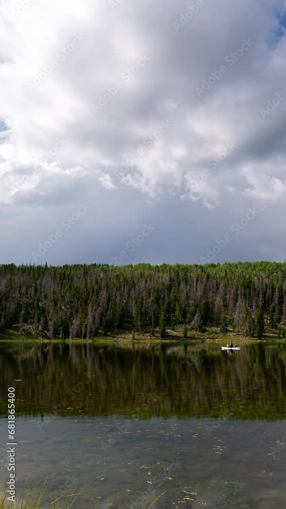 Vertical Timelapse over Big Lyman Lake in Utah as clouds move through the sky in the Uintas. Vertical Timelapse over Big Lyman Lake in Utah as clouds move through the sky in the Uintas.