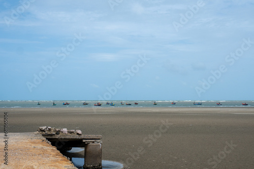 Pathway of a rural fisherman's wharf in Thailand in the morning.