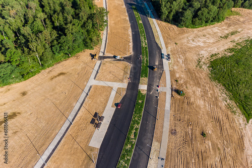 Construction of a new two-lane highway, aerial view photo