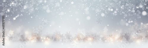 Snowfall on blurry forest background. Silver and gold abstract blurred bokeh lights and snow. Christmas and New Year holiday banner with copy space