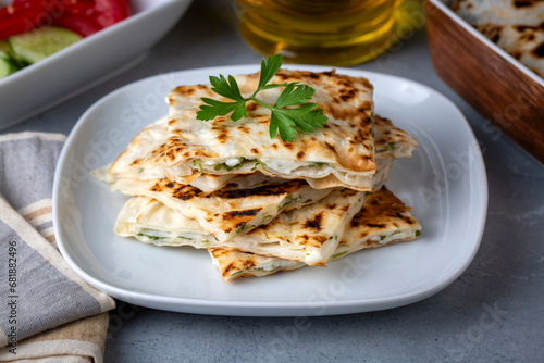 Obraz na płótnie Traditional Turkish food, Turkish pancake gozleme with cheese and herb. w salonie