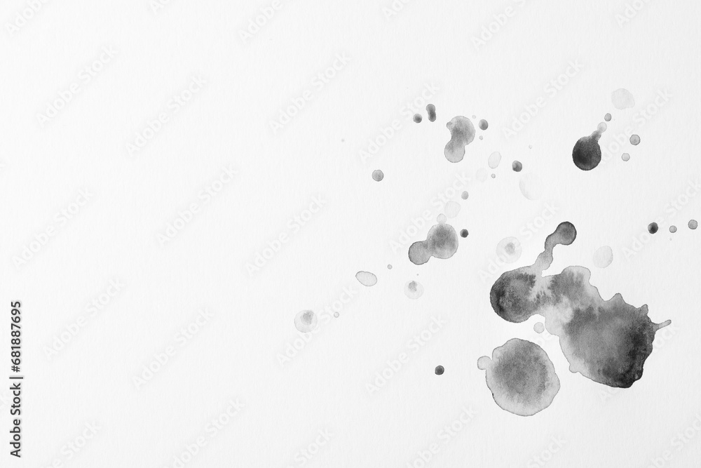 Naklejka premium Blots of black ink on white background, flat lay. Space for text