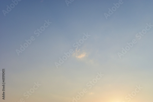 beautiful blue sky and cloud with golden ray sunrise in the morning, natural background