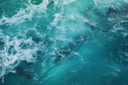Turquoise ocean waters frothing with white foam  capturing the essence of the sea for aquatic and travel themes.