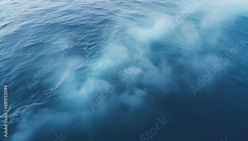Ethereal blue waves and mist, capturing a serene yet dynamic ocean scene, great for thematic visuals. © StockWorld