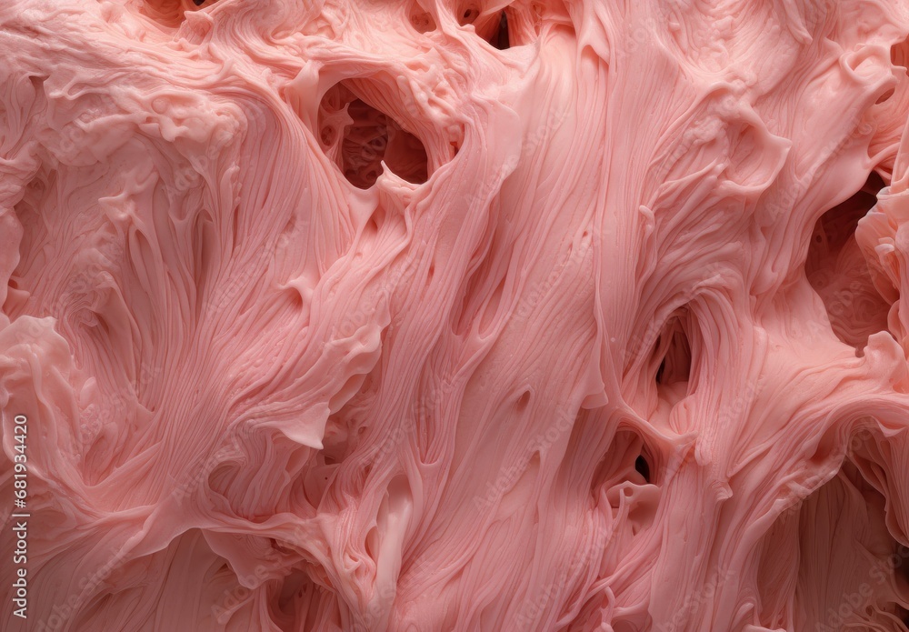 Soft pink textured substance, ideal for abstract art, cosmetics backgrounds, or organic visual concepts.