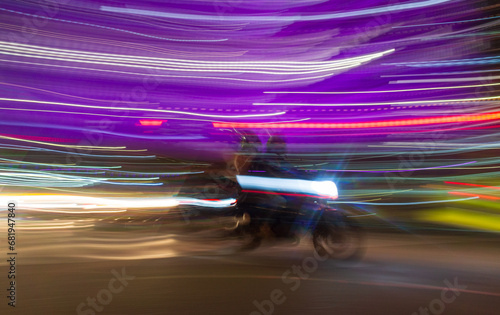 speed motion blur of motorcycle in traffic