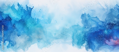 The artist created a stunning watercolor illustration with bold blue splashes, abstract textures, and vibrant colors, using water and paint to create beautiful stains on the textured paper. The hand