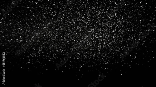 real falling snow isolates on a black background photo