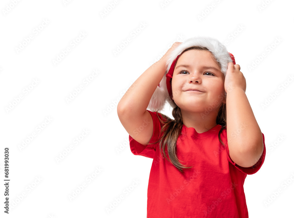 Portrait of a child in a Santa hat looking up isolated Portrait of a child in a Santa hat looking up isolated