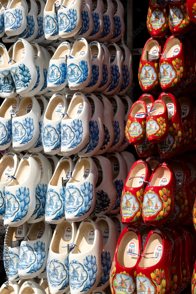 Wooden multi-colored shoes clogs in the souvenir shop Wooden multi-colored shoes clogs in the souvenir shop