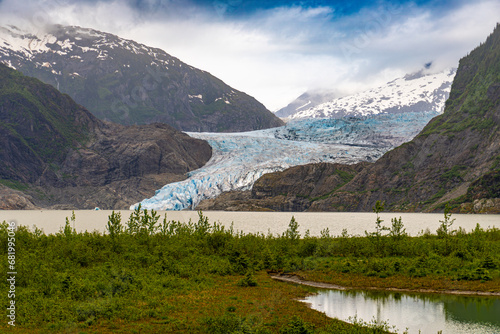 Mendenhall Glacier in Juneau, Alaska. Mendenhall Glacier Recreation Area, a federally designated unit of the Tongass National Forest. photo