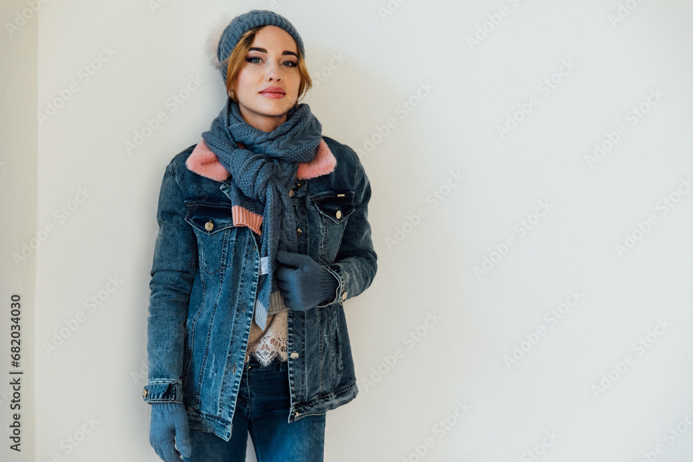 Beautiful woman in winter clothes and knitted hat Beautiful woman in winter clothes and knitted hat