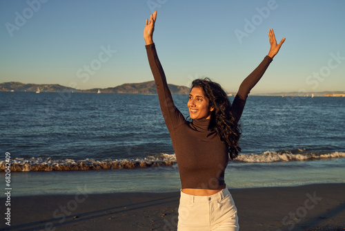 Obraz na płótnie Indian Woman Flowing or Dancing Happily at The Beach