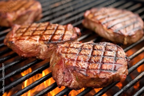 detail shot of grill marks on a pair of glazed lamb chops