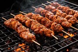 overhead shot of meatball skewers on grill
