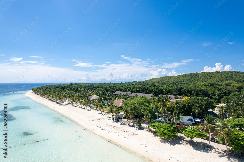 Aerial of Dumaluan Beach during a weekday in the island of Panglao, Philippines.