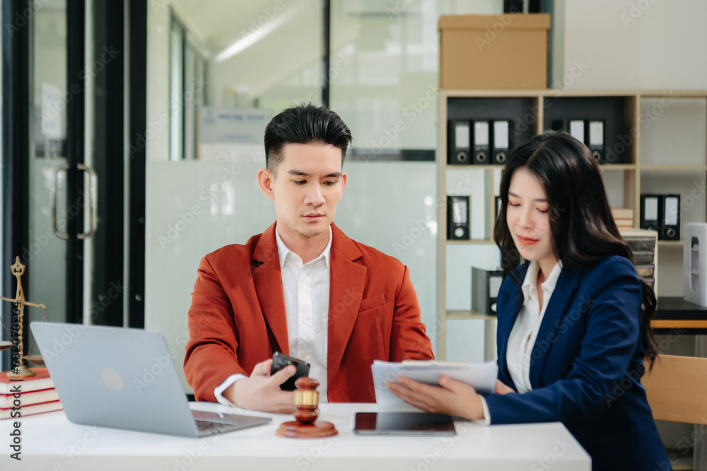 Business and Male lawyer or judge consult having team meeting with client, Law and Legal services concept.Customer service good cooperation Business and Male lawyer or judge consult having team meeting with client, Law and Legal services concept.Customer service good cooperation