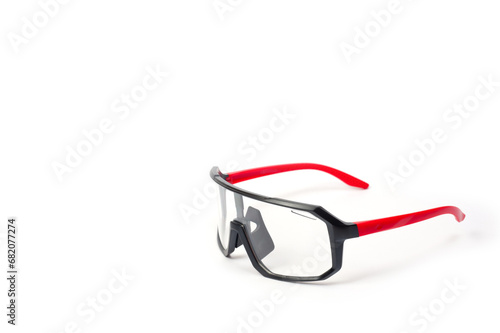 Cycling glasses for sports, unisex, plastic, with red temples.