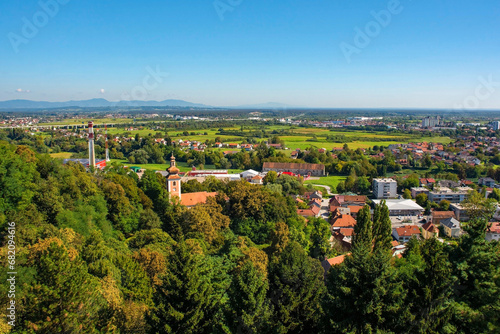 A view of the rural summer landscape near Karlovac in Central Croatia seen from the tower of Dubovac Castle. The Church of the Mother of God - Crkva Majka Bozja - is centre left. Early September photo