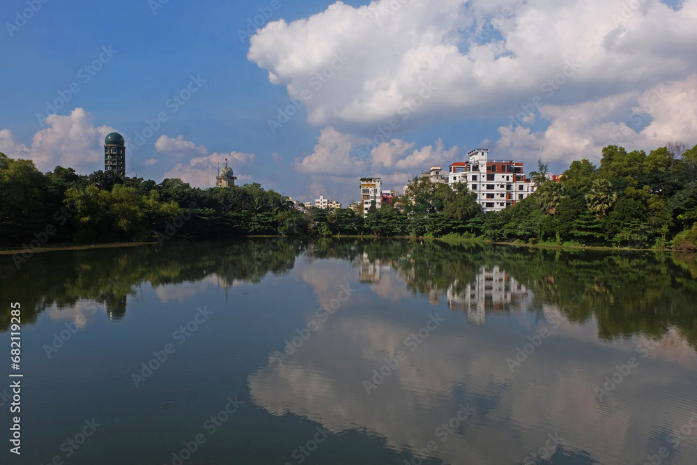 Obraz premium Landscape view of a beautiful lake with a bridge in the bottanical garden dhaka bangladesh 