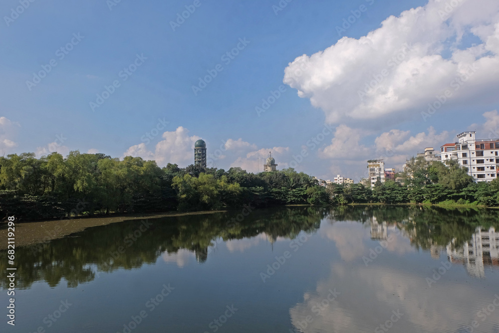 Landscape view of a beautiful lake with a bridge in the bottanical garden dhaka bangladesh 