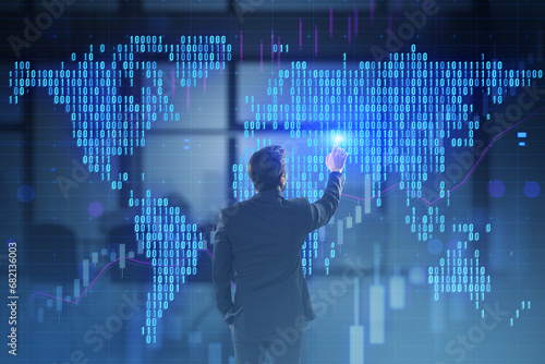 Back view of young european male using glowing digital pixel squares map of the world with spotlights on blurry toned office interior background. Global business concept. Double exposure.