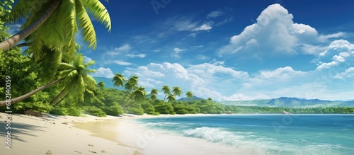 In the summery landscape of a tropical beach  the vivid green leaves of the tall trees swayed gently against the clear blue sky  while fluffy white clouds floated above the sparkling blue ocean