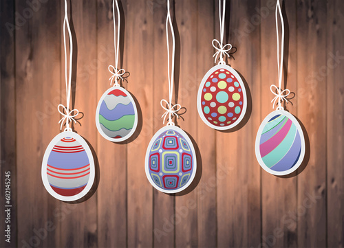 Digital png illustration of easter eggs hanging and wooden wall on transparent background