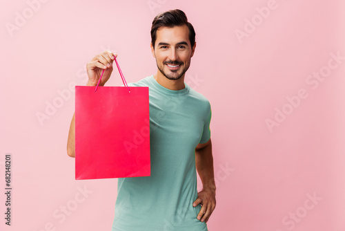 Man package pink surprise bag shopper client sale lifestyle holiday gift shop buy